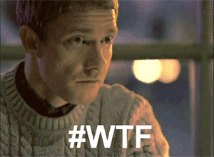 a man in a sweater says #wtf on the bottom