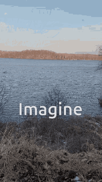 a picture of a lake with the words imagine in white letters