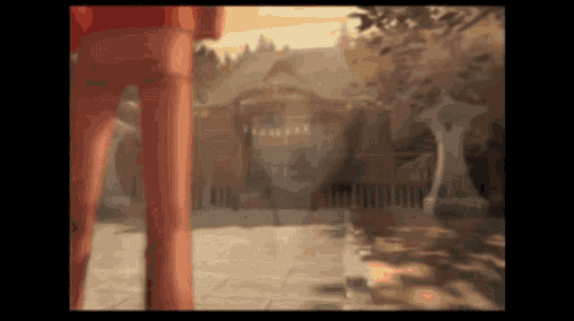 a blurry picture of a person standing in front of a gate
