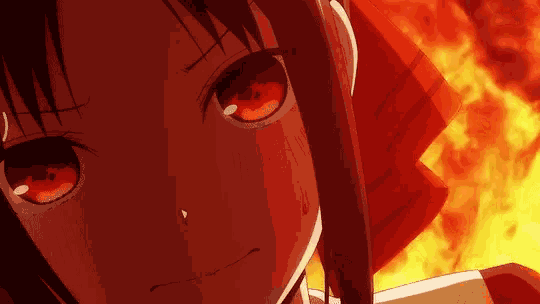 a close up of a girl with red eyes