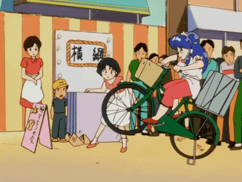a cartoon drawing of a woman riding a bike with a sign that says ' a ' on it