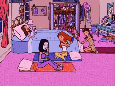 a cartoon of a girl laying on a bed