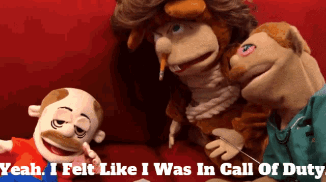 a group of puppets are sitting on a red couch and the caption says yeah i felt like i was in call of duty
