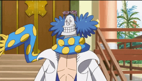 a cartoon character wearing a blue and yellow polka dot scarf and goggles