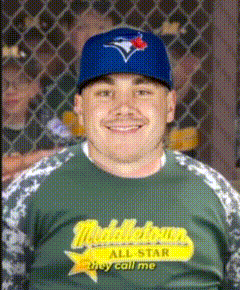 a man wearing a blue jays hat and a middletown all star shirt smiles for the camera
