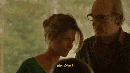 a man and a woman are standing next to each other with the woman saying mon dieu !