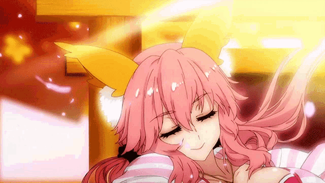 a girl with pink hair and a yellow ear is smiling