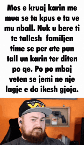 a man with a beard wearing a hat that says mos e kruaj karin me mua se ta kpus