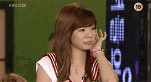 a girl with the number 15 on her shoulder