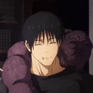 a man in a black shirt is holding a purple monster on his shoulder .
