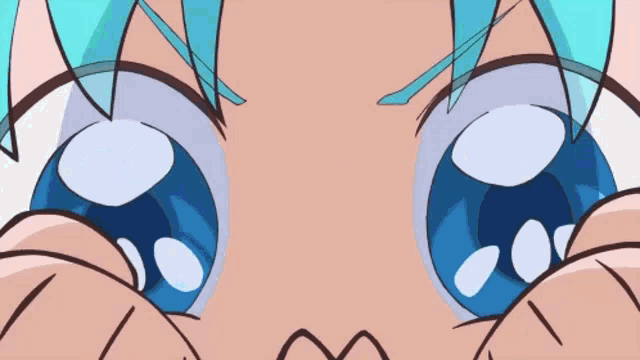 a close up of a cartoon character 's eyes with a surprised look on their face .