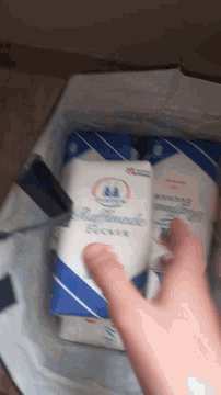 a person is reaching for a package of wipes that says johnson 's