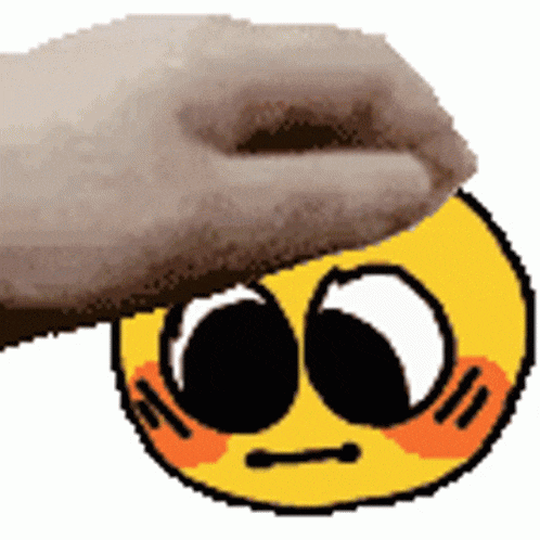 a person is petting a smiley face with a slipper on it .