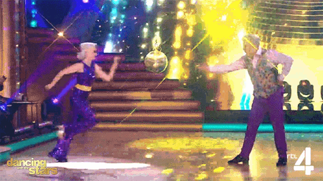 a man and a woman are dancing on dancing with the stars on rtl