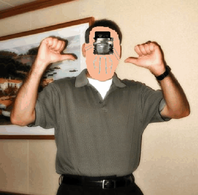 a man with a camera in front of his face is flexing his muscles