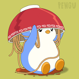 a penguin wearing a red hat with noodles on it