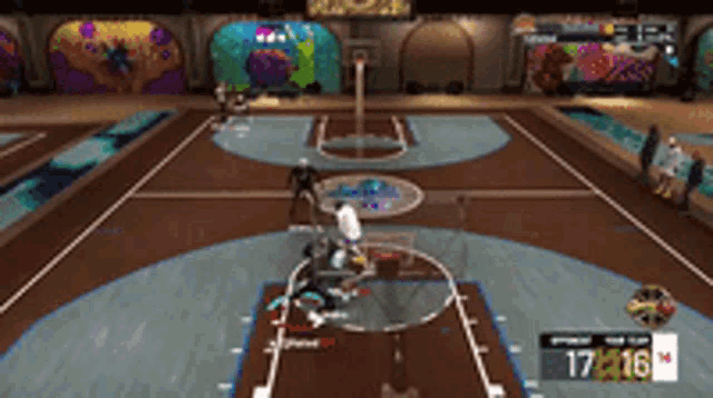 a basketball game is being played on a court with a score of 17 216