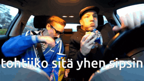 two men in a car with the words " lohtiiko sita yhen sipsin " on the bottom right