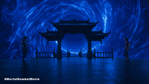 a poster for the mortal kombat movie shows two men standing in front of a blue portal