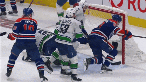 a hockey player with the number 53 on his shirt