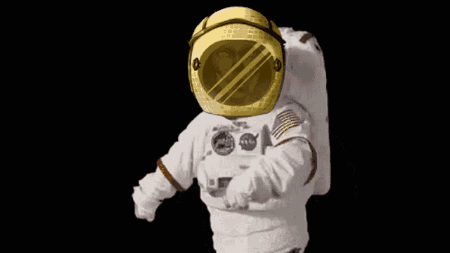 an astronaut wearing a nasa helmet and a white suit