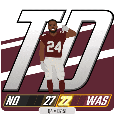 a football player with the number 24 on his jersey saluting