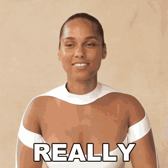a woman in a white top has the word really written on her chest