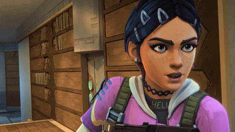 a girl in a pink jacket with the word hell on it