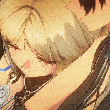 a girl with a cross on her forehead is being held by a man