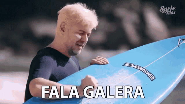 a man holding a surfboard with the words fala galera on it