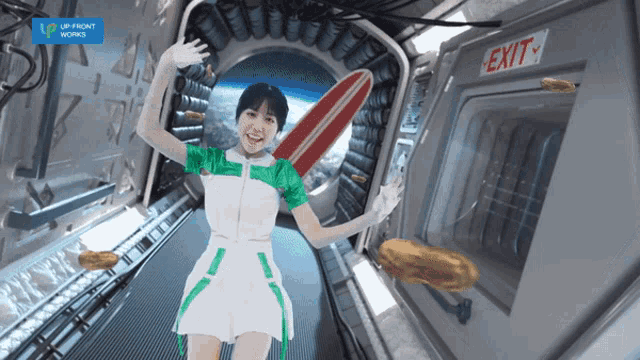 a woman in a green and white dress is standing in a spaceship with an exit sign in front of her