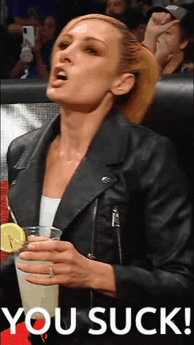 a woman in a leather jacket is holding a glass of lemonade with the words you suck below her