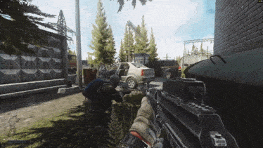 a screenshot of a video game shows a person holding a rifle