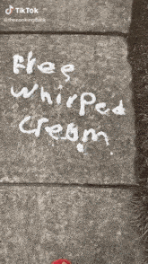 a chalkboard with the words free whipped cream written on it .