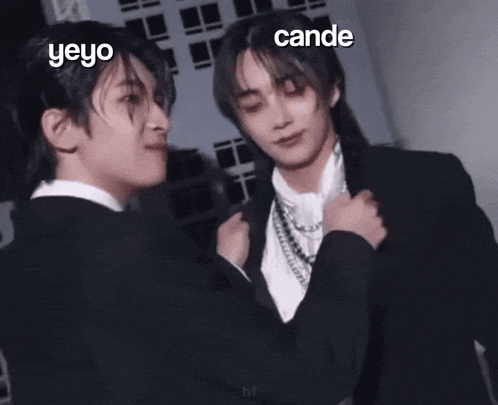 two men in suits are standing next to each other with the words yeyo and cande written above them