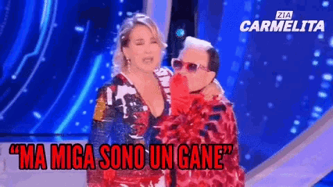 a man kissing a woman on the cheek with the words ma miga sono un gane in red letters