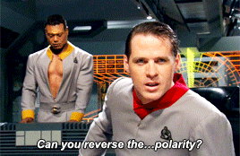 a man in a grey uniform says " can you reverse the polarity "