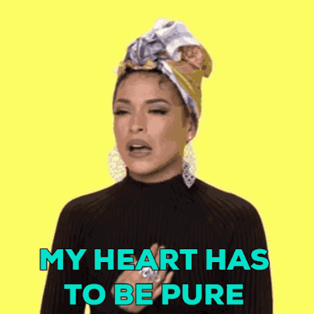 a woman with a head scarf on her head is saying my heart has to be pure