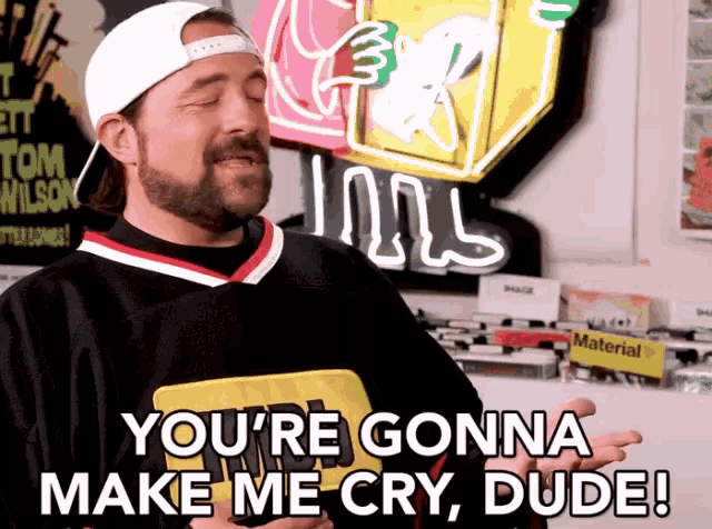 a man in a black and red jersey says you 're gonna make me cry dude