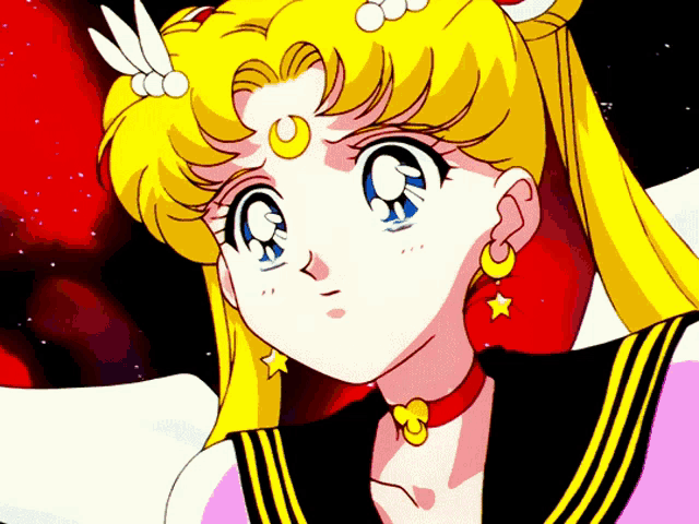 a close up of a cartoon girl with a crescent moon on her forehead