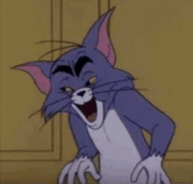 tom from tom and jerry is making a funny face with his mouth wide open .