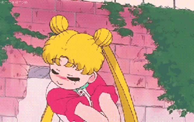 a cartoon of a girl with a bun on her head and a brick wall in the background