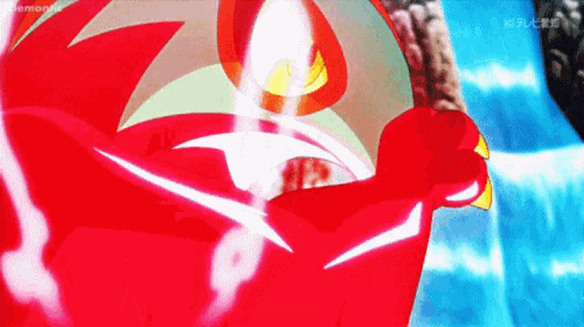 a close up of a cartoon character with a waterfall in the background .