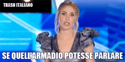 a woman in a silver dress says trash italiano se quell 'armadio potesse parlare