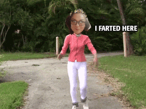 a woman walking down a path with the words " i farted here " written on the bottom