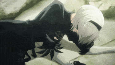 a black and white anime character with the number 2 on her chest