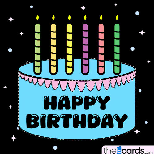 a birthday cake with candles and the words happy birthday written on it