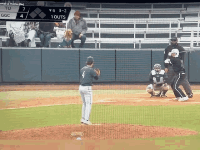 a baseball game is being played between tu and thomas state