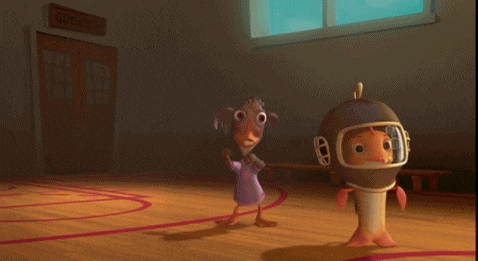 two cartoon characters standing in front of a gym door