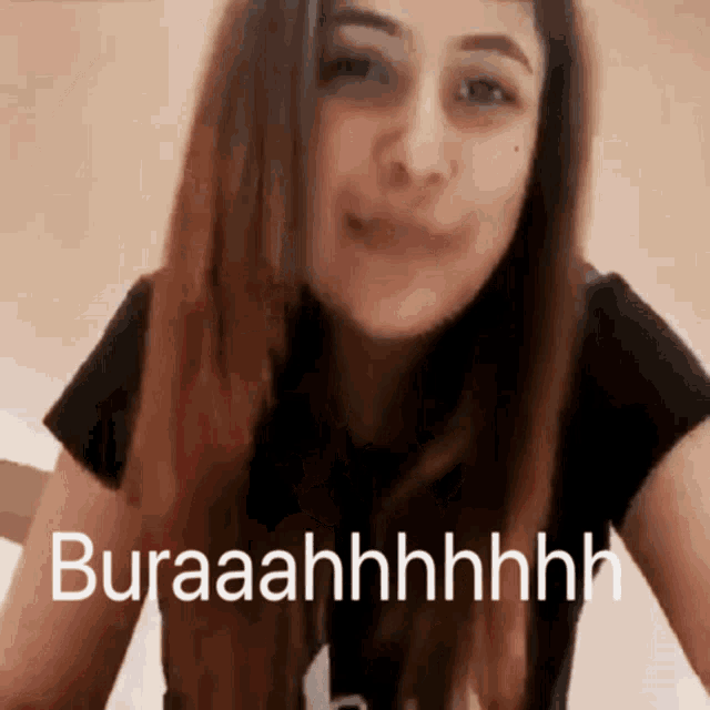 a woman in a black shirt says " buraaahhhhhhhh "